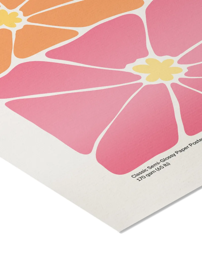 The image is a close-up of a colorful, abstract floral pattern on a piece of paper.